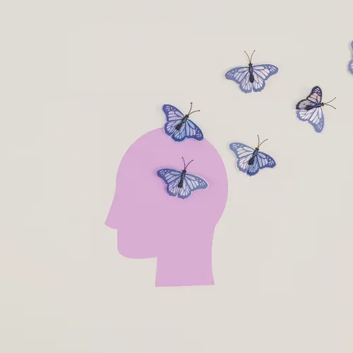 Illustrazione di un profilo con farfalle che escono dalla mente